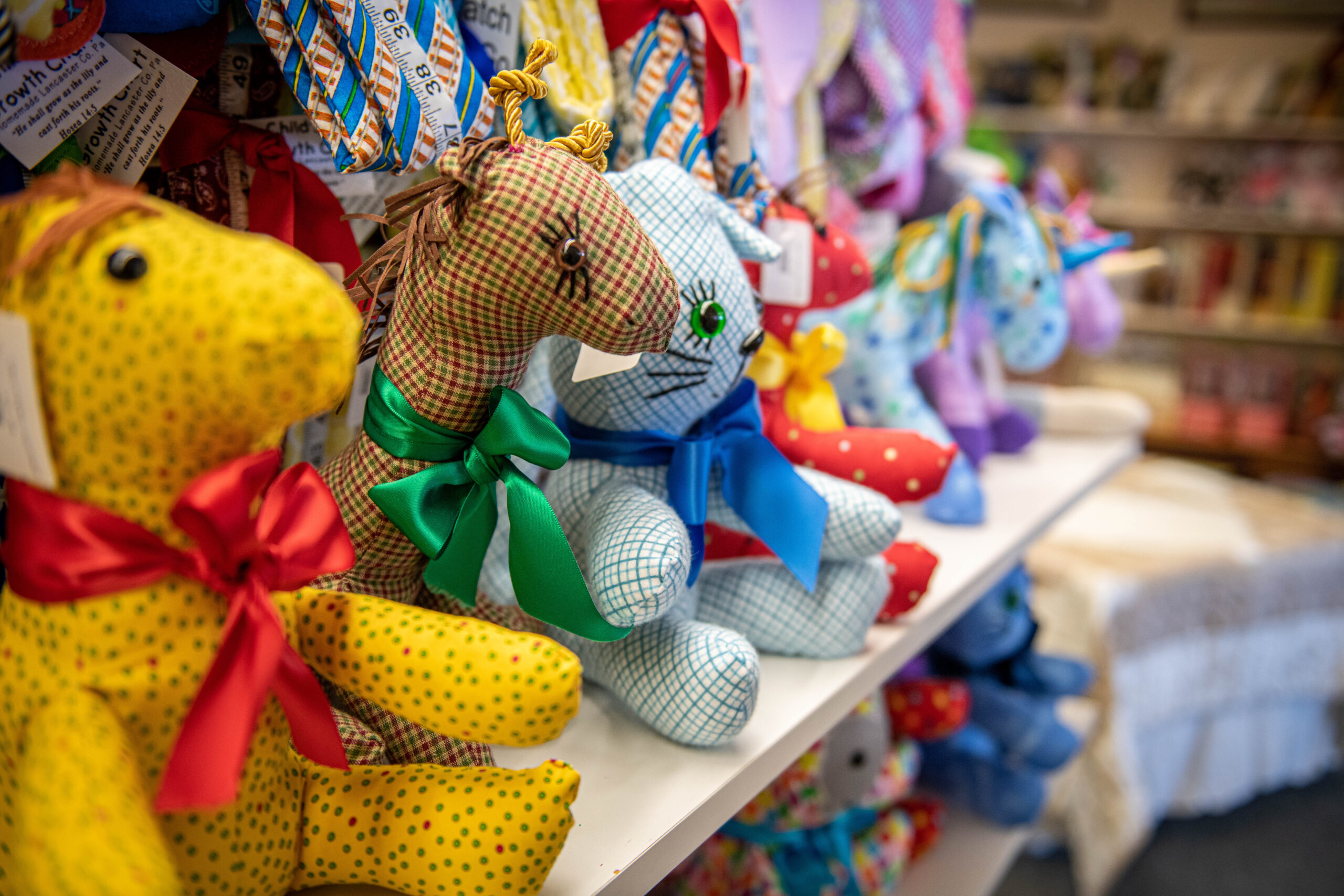 Handmade stuffed animals in many colors