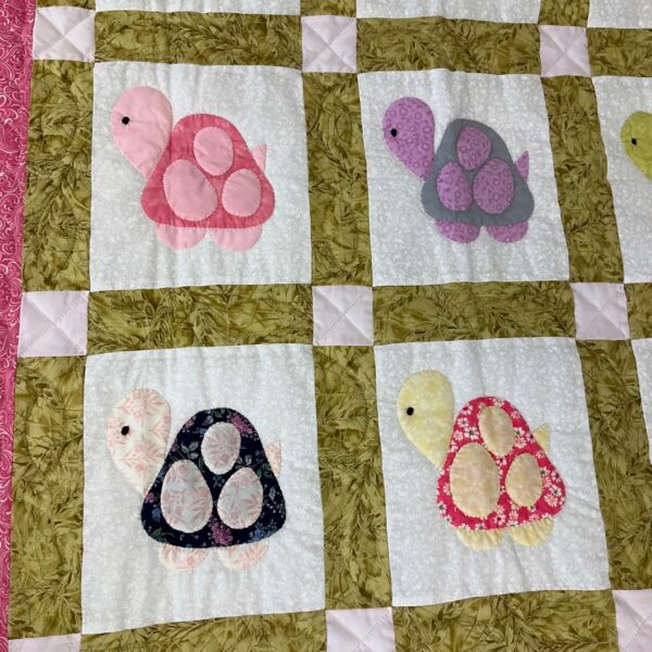 A Baby Quilt in Shades of Pink and Purple with Hand-Appliqued Turtles - Image 2