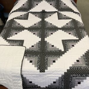 An Elegant Black and White Log Cabin Quilt