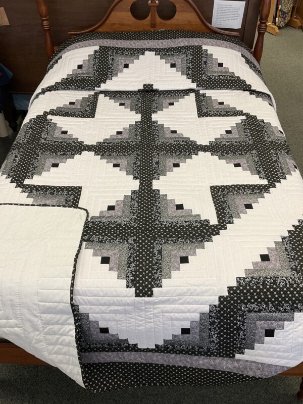 An Elegant Black and White Log Cabin Quilt