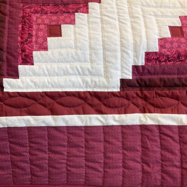 Close up of the border and decorative hand quilting.