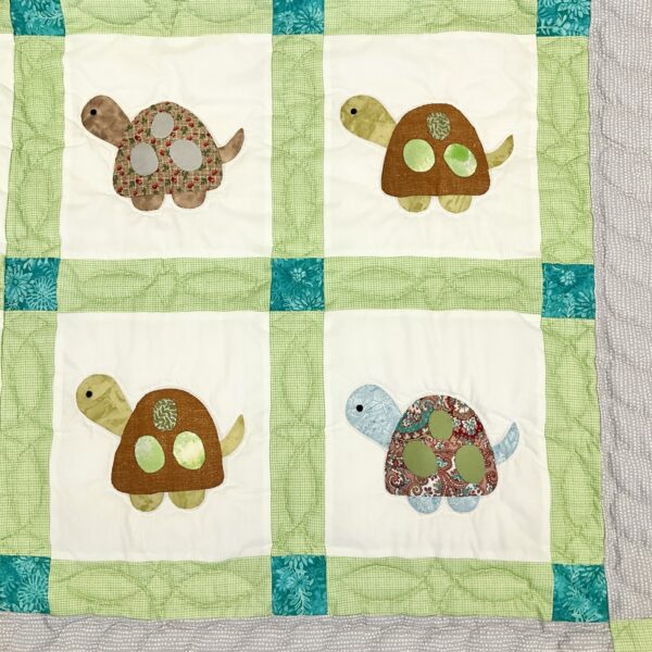 A Baby Quilt in Shades of Green and Grey with Hand-Appliqued Turtles - Image 2