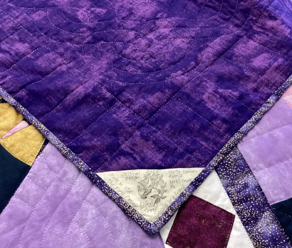 The First Cosmos -quilt label