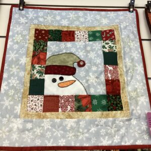 Whimsical Peeking out Snowman Wall Hanging