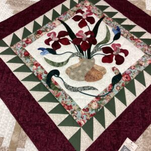 Applique Iris Flowers in a whimsical vase on a bias bed topper