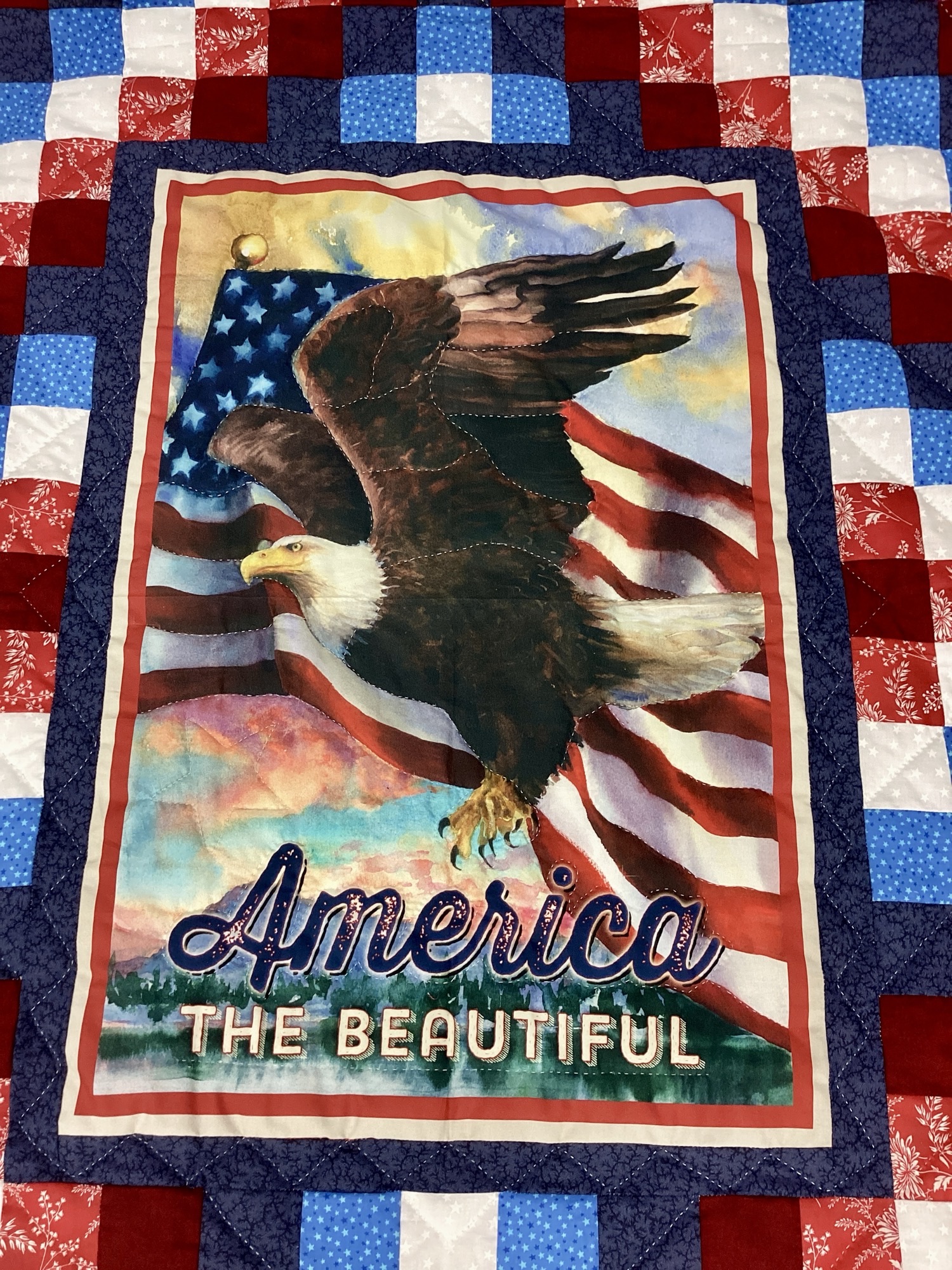 Hand-stitched Americana quilt throw with Trip Around the World patchwork pattern