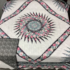 Handmade Lancaster County Amish Sawtooth Medallion quilt with floral starburst center, pink roses, aqua succulents, ivory background and black binding