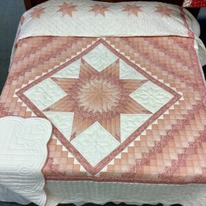 Handmade Lancaster County Mennonite Star N Common quilt with blush peach center star, cream background and scalloped border